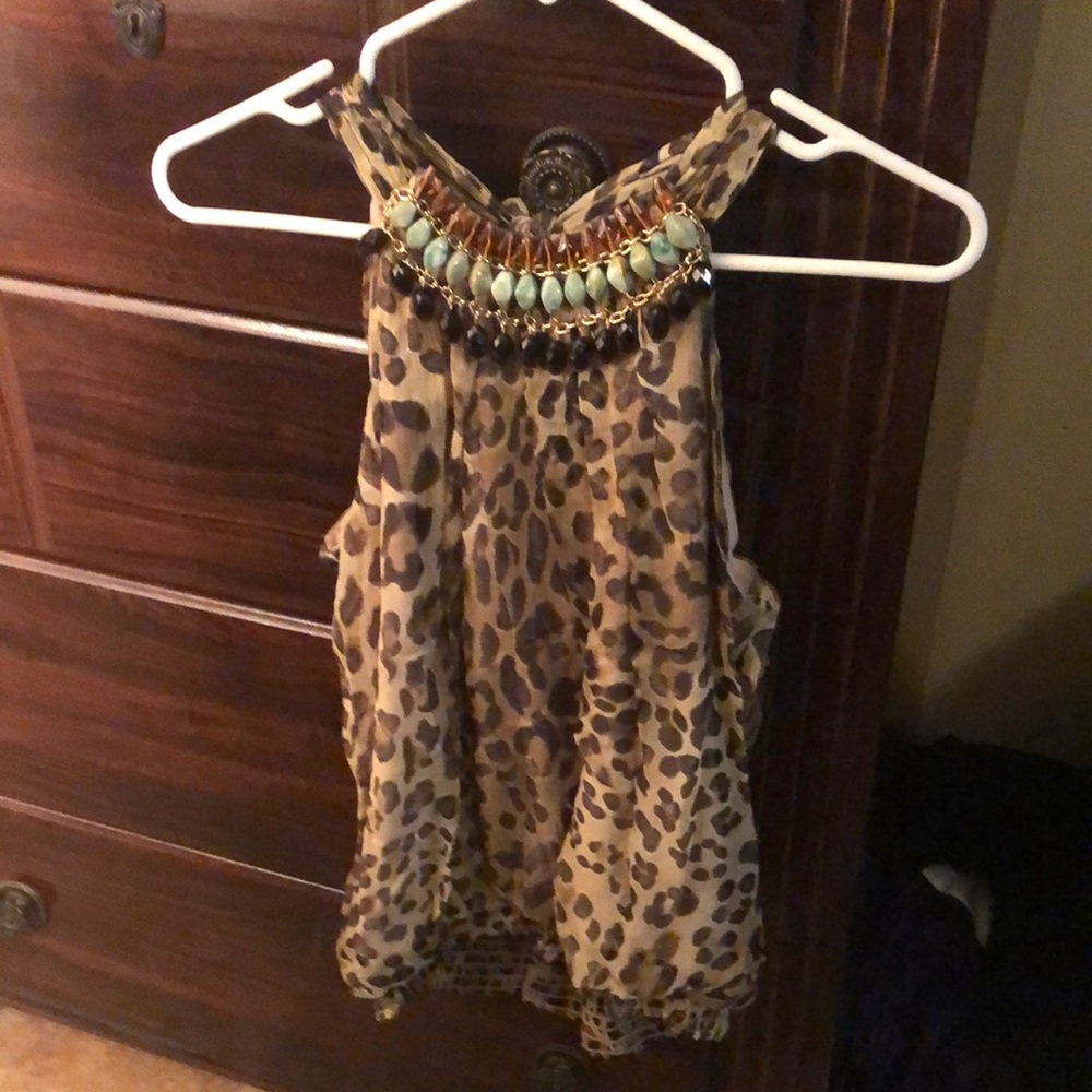 Leopard top with Bead on the neck I hate departing with this top it is so pretty